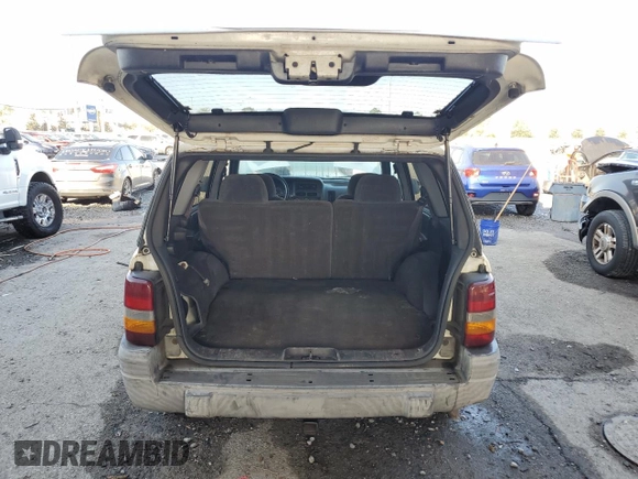 1997 Jeep Grand Cherokee TSi with VIN 1J4FX58S2VC612449, listed as a Copart auction lot 43532675 with 221,382 mi miles and Salvage Title. Bid and sale history available at carsss.com. Image 6.