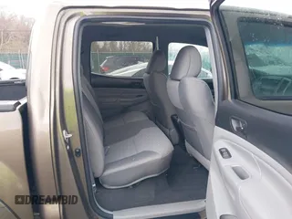 2015 Toyota Tacoma with VIN 3TMLU4EN1FM201554, listed as a IAAI auction lot 42008012 with 118,313 mi miles and . Bid and sale history available at DreamBid. Image 8.