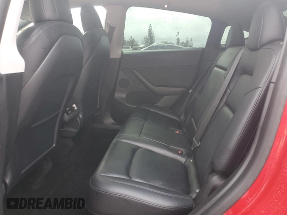 2022 Tesla Model Y Performance с VIN 7SAYGDEF7NF335903, выставлен на аукционе Copart как лот 48883035 с пробегом 73 132 миль миль и Списание • Salvage title. История ставок и продаж доступна на DreamBid. Изображение 11.