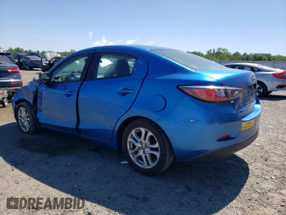 2016 Scion iA with VIN 3MYDLBZV0GY126458, listed as a Copart auction lot 57821414 with 89,427 mi miles and Salvage Title. Bid and sale history available at carsss.com. Image 2.