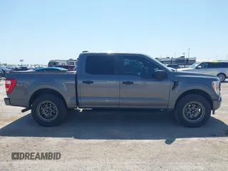 2021 Ford F-150 XL z VIN 1FTEW1CP3MKD15193, wystawiony jako IAAI lot #41984460 z przebiegiem 74 202 mil mil oraz . Historia ofert i sprzedaży dostępna na DreamBid. Obrazek 13.
