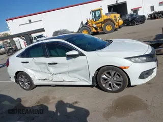 2017 Honda Civic Sedan EX-L with VIN 2HGFC1F71HH636172, listed as a IAAI auction lot 38464968 with 74,030 mi miles. Bid and sale history available at carsss.com. Image 13.