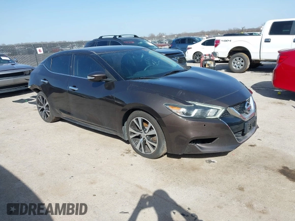 2016 Nissan Maxima Platinum with VIN 1N4AA6AP2GC385723, listed as a IAAI auction lot 41753328 with 162,845 mi miles and . Bid and sale history available at DreamBid. Image 1.