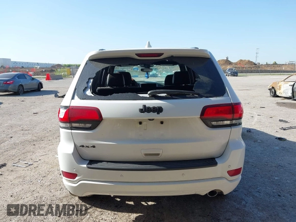 2020 Jeep Grand Cherokee Laredo E with VIN 1C4RJFAGXLC178892, listed as a IAAI auction lot 41998211 with 83,022 mi miles and . Bid and sale history available at DreamBid. Image 16.