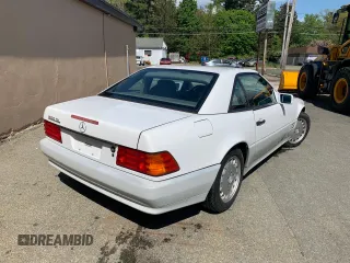 1992 Mercedes-Benz 500 z VIN WDBFA66EXNF052820, wystawiony jako Copart lot #55408835 z przebiegiem 113 571 mil mil oraz Tytuł czysty. Historia ofert i sprzedaży dostępna na DreamBid. Obrazek 4.