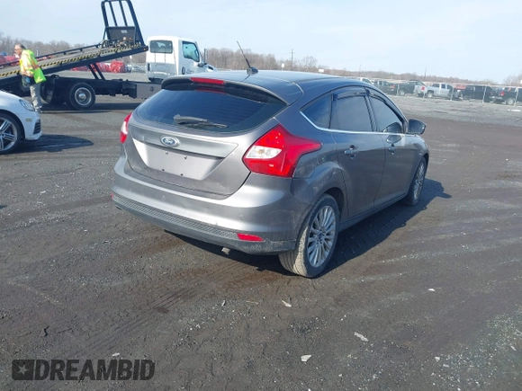 2012 Ford Focus Titanium with VIN 1FAHP3N28CL270225, listed as a IAAI auction lot 41401080 with 80,650 mi miles and . Bid and sale history available at carsss.com. Image 4.
