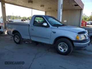 1999 Ford F-150 XL with VIN 1FTRF17L7XNA73732, listed as a Copart auction lot 74388514 with Not provided miles and Clean title. Bid and sale history available at DreamBid. Image 4.
