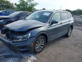 2020 Volkswagen Tiguan S с VIN 3VV1B7AX5LM151924, выставлен на аукционе IAAI как лот 42084869 с пробегом 74 176 миль миль и . История ставок и продаж доступна на DreamBid. Изображение 2.