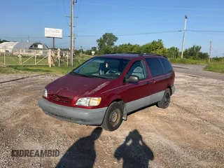 1999 Toyota Sienna LE with VIN 4T3ZF13C5XU141279, listed as a Copart auction lot 64366315 with 218,223 mi miles and Clean title. Bid and sale history available at DreamBid. Image 2.