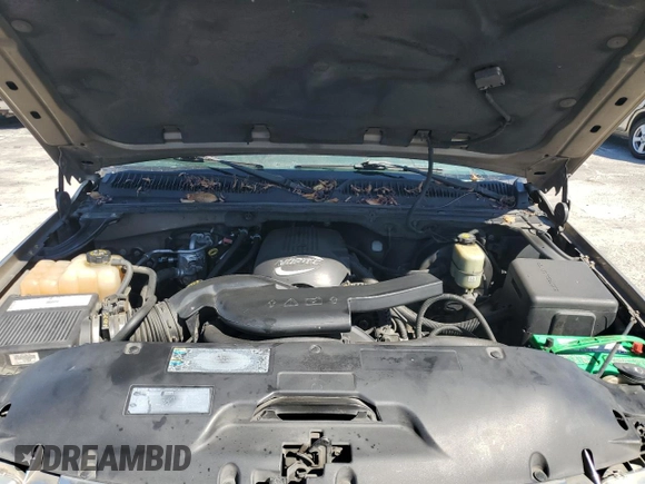 2002 Chevrolet Tahoe LS с VIN 1GNEC13T62R243097, выставлен на аукционе Copart как лот 64210815 с пробегом 254 318 миль миль и Списание • Salvage title. История ставок и продаж доступна на DreamBid. Изображение 12.