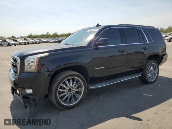 2016 GMC Yukon SLT with VIN 1GKS1BKCXGR122111, listed as a Copart auction lot 69900124 with 73,781 mi miles and Salvage Title. Bid and sale history available at carsss.com. Image 1.