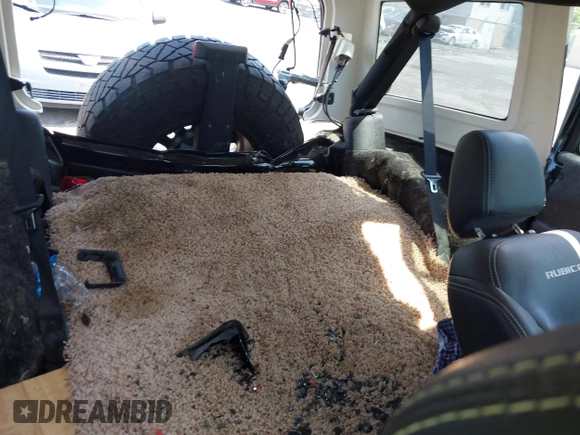 2017 Jeep Wrangler Unlimited Rubicon Recon with VIN 1C4BJWFG7HL525709, listed as a IAAI auction lot 42569577 with 119,560 mi miles and . Bid and sale history available at DreamBid. Image 8.