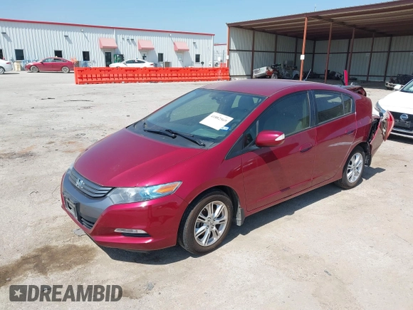 2010 Honda Insight EX with VIN JHMZE2H73AS009253, listed as a IAAI auction lot 41882569 with 104,839 mi miles and . Bid and sale history available at DreamBid. Image 2.
