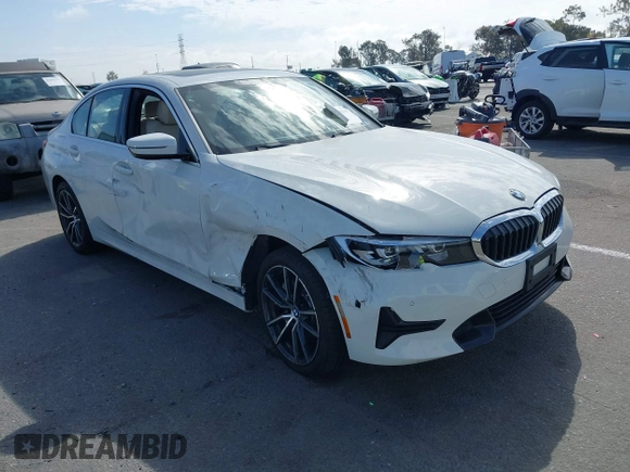 2019 BMW 3 Series 330i with VIN WBA5R1C55KAK12332, listed as a IAAI auction lot 41692035 with 13,657 mi miles and . Bid and sale history available at DreamBid. Image 1.