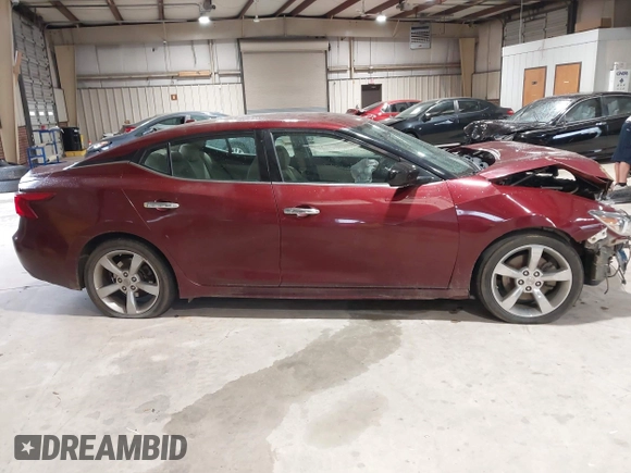 2016 Nissan Maxima SV z VIN 1N4AA6AP8GC431166, wystawiony jako IAAI lot #41973524 z przebiegiem 119 093 mil mil oraz . Historia ofert i sprzedaży dostępna na DreamBid. Obrazek 14.