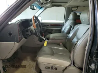 2006 Cadillac Escalade z VIN 1GYEK63N56R139033, wystawiony jako Copart lot #59661465 z przebiegiem Nie podano mil oraz Czysty tytuł • Clean title. Historia ofert i sprzedaży dostępna na DreamBid. Obrazek 7.