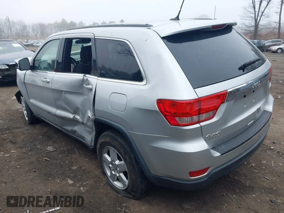 2013 Jeep Grand Cherokee Laredo with VIN 1C4RJFAGXDC537367, listed as a IAAI auction lot 41906921 with 124,679 mi miles. Bid and sale history available at carsss.com. Image 3.