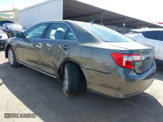 2012 Toyota Camry Hybrid XLE with VIN 4T1BD1FK0CU020723, listed as a IAAI auction lot 42031093 with 121,297 mi miles. Bid and sale history available at carsss.com. Image 3.