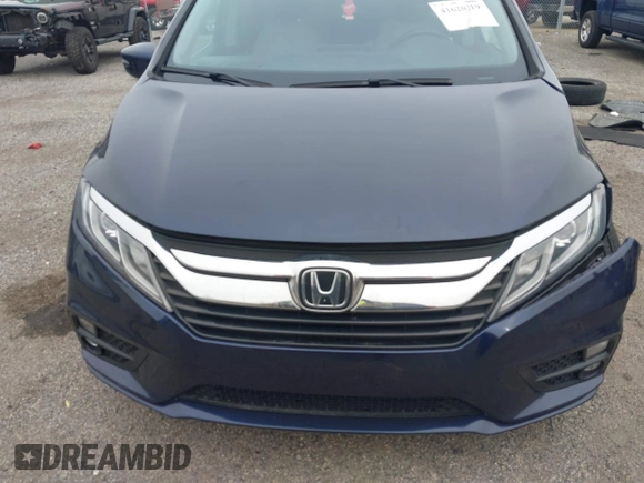 2020 Honda Odyssey EX-L with VIN 5FNRL6H70LB055122, listed as a IAAI auction lot 41620219 with 129,582 mi miles. Bid and sale history available at carsss.com. Image 12.