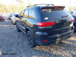 2015 Jeep Grand Cherokee Altitude with VIN 1C4RJFAG6FC796571, listed as a IAAI auction lot 41258471 with 104,049 mi miles. Bid and sale history available at carsss.com. Image 3.