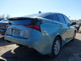 2022 Toyota Prius L Eco with VIN JTDKAMFU3N3187053, listed as a IAAI auction lot 41741417 with 152,444 mi miles. Bid and sale history available at carsss.com. Image 4.