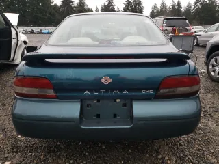 1997 Nissan Altima XE with VIN 1N4BU31D3VC222205, listed as a Copart auction lot 84018274 with 261,349 mi miles and Salvage Title. Bid and sale history available at carsss.com. Image 6.