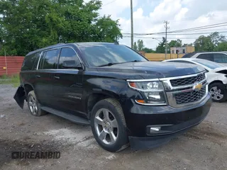 2016 Chevrolet Suburban LT with VIN 1GNSKHKC5GR399915, listed as a IAAI auction lot 42478012 with 154,469 mi miles and . Bid and sale history available at DreamBid. Image 1.