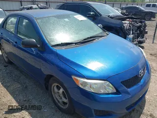 2009 Toyota Corolla with VIN JTDBL40E799044489, listed as a IAAI auction lot 42053660 with 186,356 mi miles. Bid and sale history available at carsss.com. Image 1.
