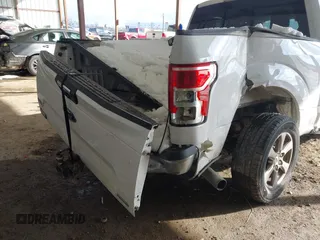 2019 Ford F-150 XL with VIN 1FTEW1CP7KKC75312, listed as a IAAI auction lot 41271422 with 135,228 mi miles and . Bid and sale history available at carsss.com. Image 18.