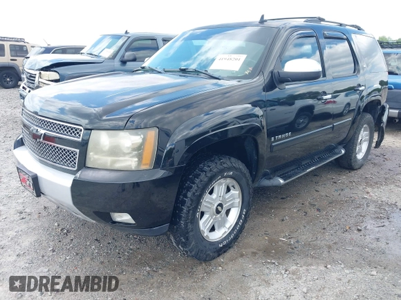 2007 Chevrolet Tahoe LT z VIN 1GNFK13097R388333, wystawiony jako IAAI lot #41948201 z przebiegiem 253 972 mil mil oraz . Historia ofert i sprzedaży dostępna na DreamBid. Obrazek 18.