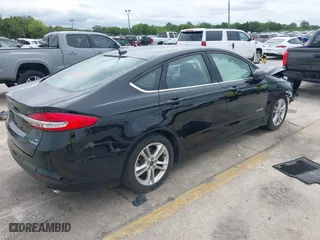 2018 Ford Fusion Hybrid SE with VIN 3FA6P0LU9JR286359, listed as a IAAI auction lot 41973064 with 145,267 mi miles. Bid and sale history available at carsss.com. Image 4.