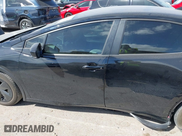 2023 Toyota Prius LE with VIN JTDACAAUXP3008201, listed as a IAAI auction lot 41824469 with 27,864 mi miles and . Bid and sale history available at carsss.com. Image 14.
