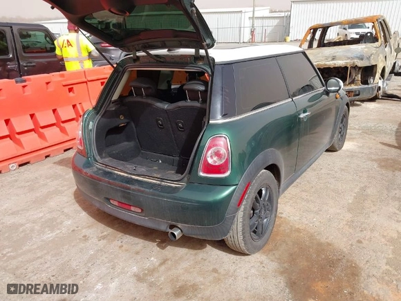 2013 MINI Cooper Hardtop with VIN WMWSU3C52DT690373, listed as a IAAI auction lot 41777229 with 125,190 mi miles. Bid and sale history available at carsss.com. Image 3.
