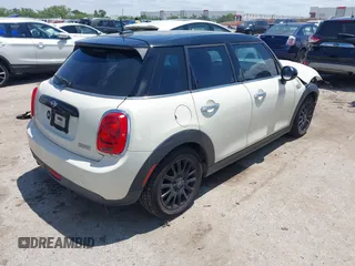 2016 MINI Hardtop 4 Door z VIN WMWXU1C50G2D08848, wystawiony jako IAAI lot #42215256 z przebiegiem 102 643 mil mil oraz . Historia ofert i sprzedaży dostępna na DreamBid. Obrazek 4.