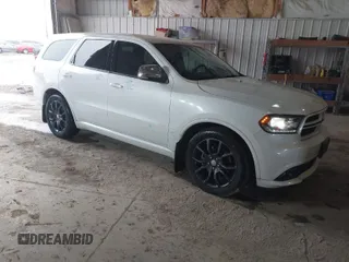 2016 Dodge Durango R/T with VIN 1C4SDJCT0GC419015, listed as a IAAI auction lot 41712230 with 159,523 mi miles and . Bid and sale history available at DreamBid. Image 1.