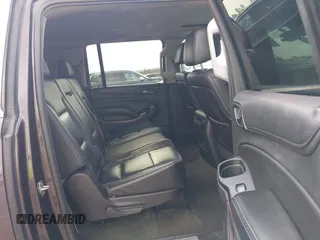 2015 Chevrolet Suburban LT with VIN 1GNSCJKCXFR175154, listed as a IAAI auction lot 42280418 with 227,373 mi miles and . Bid and sale history available at DreamBid. Image 8.