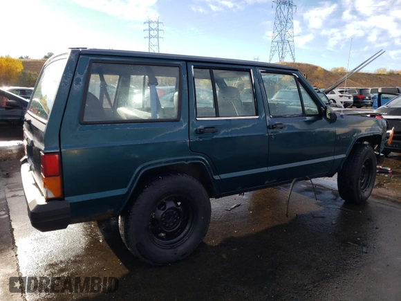 1996 Jeep Cherokee SE z VIN 1J4FJ28S6TL184205, wystawiony jako Copart lot #77558034 z przebiegiem 195 000 mil mil oraz Tytuł czysty. Historia ofert i sprzedaży dostępna na DreamBid. Obrazek 3.