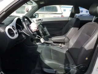 2012 Volkswagen Beetle 2.5L PZEV with VIN 3VWJP7AT1CM630089, listed as a Copart auction lot 82707554 with 79,617 mi miles and Salvage Title. Bid and sale history available at carsss.com. Image 7.