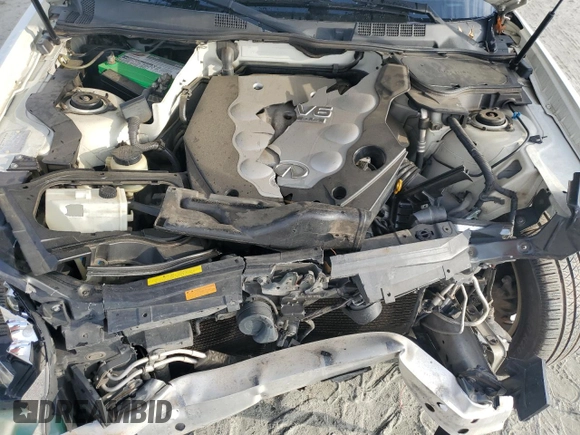2008 Infiniti FX z VIN JNRAS08U18X100309, wystawiony jako Copart lot #82157174 z przebiegiem 165 983 mil mil oraz Szkoda całkowita • Salvage title. Historia ofert i sprzedaży dostępna na DreamBid. Obrazek 11.