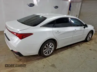 2021 Toyota Avalon XLE z VIN 4T1AZ1FB0MU060010, wystawiony jako Copart lot #56844085 z przebiegiem 115 788 mil mil oraz Czysty tytuł • Clean title. Historia ofert i sprzedaży dostępna na DreamBid. Obrazek 3.