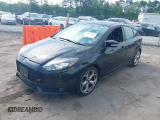 2014 Ford Focus ST with VIN 1FADP3L98EL269058, listed as a IAAI auction lot 42169021 with 106,325 mi miles and . Bid and sale history available at carsss.com. Image 17.