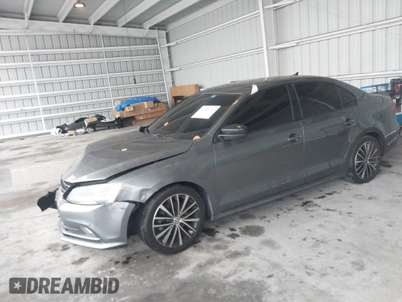 2016 Volkswagen Jetta Sport z VIN 3VWD17AJ3GM416482, wystawiony jako IAAI lot #41653790 z przebiegiem 109 380 mil mil oraz . Historia ofert i sprzedaży dostępna na DreamBid. Obrazek 16.