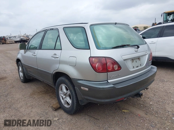 1999 Lexus RX 300 with VIN JT6HF10UXX0083402, listed as a IAAI auction lot 42102612 with 192,697 mi miles and . Bid and sale history available at DreamBid. Image 3.
