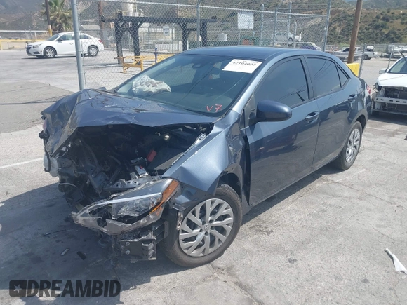 2019 Toyota Corolla L z VIN 2T1BURHE4KC215942, wystawiony jako IAAI lot #42104097 z przebiegiem 87 020 mil mil oraz . Historia ofert i sprzedaży dostępna na DreamBid. Obrazek 2.