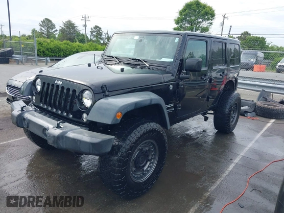 2015 Jeep Wrangler Unlimited Willys Wheeler with VIN 1C4BJWDG4FL687829, listed as a IAAI auction lot 42099147 with 98,969 mi miles and . Bid and sale history available at DreamBid. Image 18.