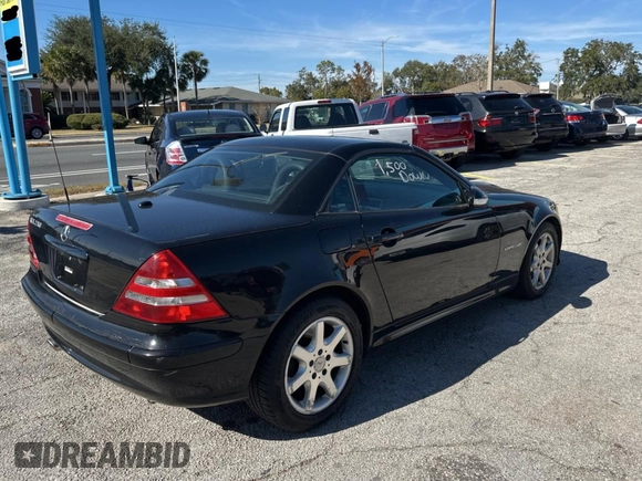 2002 Mercedes-Benz SLK-Class 2.3L Kompressor with VIN WDBKK49FX2F265220, listed as a Copart auction lot 84038354 with 90,860 mi miles and Clean Title. Bid and sale history available at carsss.com. Image 4.