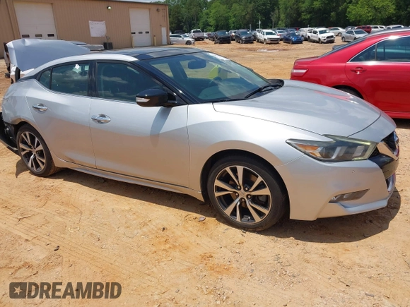 2016 Nissan Maxima SR with VIN 1N4AA6AP7GC389606, listed as a IAAI auction lot 42451614 with 114,957 mi miles and . Bid and sale history available at DreamBid. Image 1.