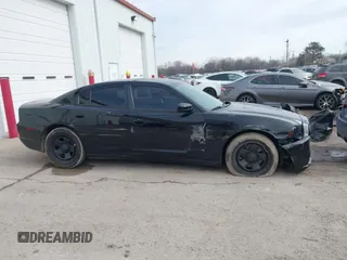 2013 Dodge Charger Police z VIN 2C3CDXAG5DH716369, wystawiony jako IAAI lot #41645644 z przebiegiem 127 535 mil mil oraz . Historia ofert i sprzedaży dostępna na DreamBid. Obrazek 13.