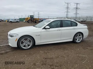 2013 BMW 5 Series 550i xDrive with VIN WBAFU9C5XDDY71137, listed as a Copart auction lot 52079765 with 123,628 mi miles and Salvage title. Bid and sale history available at DreamBid. Image 1.