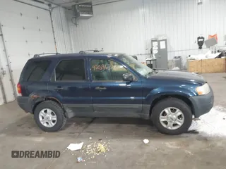 2003 Ford Escape XLT Popular with VIN 1FMYU03103KA06087, listed as a IAAI auction lot 42596326 with 210,441 mi miles and . Bid and sale history available at DreamBid. Image 13.
